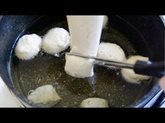 the food is being cooked in the skillet with ice cubes and oil on top