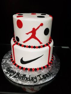 a birthday cake that is decorated to look like a basketball player