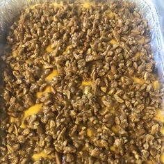 a tray filled with lots of food sitting on top of a table