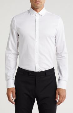 Serve easy stylish looks in this core button-up shirt cut in slim silhouette from pure cotton. Front button closure Spread collar Long sleeves with adjustable button cuffs 100% cotton Machine wash, tumble dry Imported Mens White Dress Shirt, White Fitted Dress, Party Inspo, White Button Up, White Button Down, White Shirt Dress, Cut Shirts, Mens Shirt Dress, Nordstrom Rack