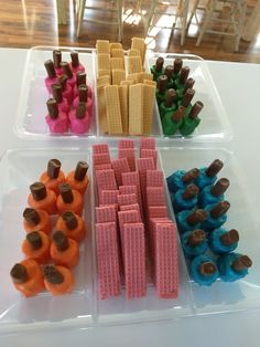 plastic trays filled with different types of candy