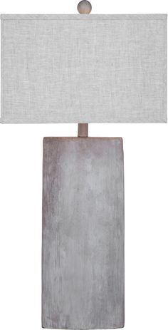 a gray lamp with a white shade on it's base and a light bulb in the middle