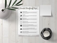 a house hunting tips sheet next to a cup of coffee and a plant on a wooden table