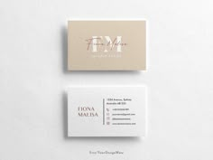 two business cards on top of each other, one with the letter m in it