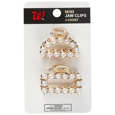 Elevate any look and add an elegant touch with this set of 2 fashion mini clips featuring a series of glam faux pearls. Small in size yet big on glitz, these chic clips open easily and close securely for comfortable all-day or all-night hold. Create the perfect side part or updo in seconds. Designed with an opening in the middle, these versatile accessories are also great for creating ponytails with an eye-catching accent. Encrusted with faux pearls in a gold-tone setting, they're ideal for Mini Clips, Side Part, Hair Barrettes, Mini Fashion, Barrettes, Faux Pearl, Gold Tones, Gold