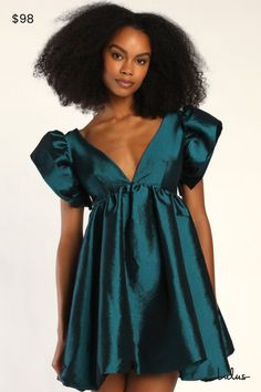 The Lulus Dramatic Dreams Dark Teal Taffeta Ruffled Babydoll Dress is the only reason we need to get dressed up! Shiny, woven taffeta shapes this stunning dress with a darted bodice, plunging V-neckline, and a low scoop back, framed by dramatic ruffled sleeves (with no-slip strips). The babydoll silhouette features an empire waist that tops an A-line mini skirt that ends at bubble hem. Hidden back zipper/clasp. Fit: This garment fits true to size. Length: Above mid-thigh. Size medium measures 34.5" from shoulder to hem. Bust: Works best for A to C cup sizes - consider sizing up for fuller bust. Waist: Fitted - very fitted at natural waist. Hip: Not Fitted - fuller skirt allows room for hips. Undergarments: May be worn with petals, or no bra. Fabric: Fabric has no stretch. Lined. Shell: 95% Empire Waist Hoco Dress, Black Ruffle Hoco Dress, Recruitment Dresses Sorority, Mid Length Hoco Dresses, Teal Homecoming Dress, Hoco Dress Loose, 2024 Hoco Dresses, Fall Wedding Guest Dress November, Gala Photoshoot