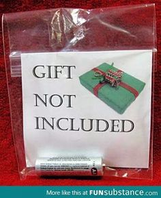 a sign that says gift not included on the back of a bag with a red bow