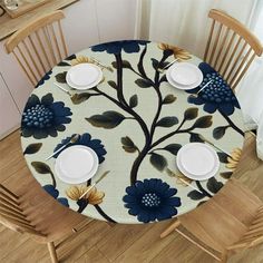 a dining room table with blue flowers on it