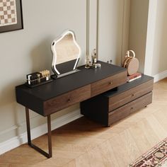 a desk with a mirror and other items on it in front of a door way