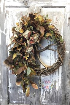 a wreath is hanging on the front door