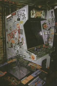 an old fashioned video game with lots of stickers on it