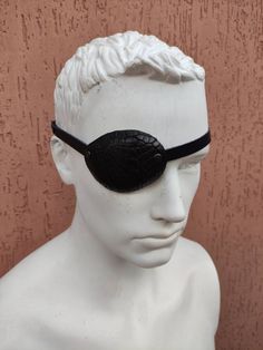 Genuine Crocodile Leather Eye Patch, Sport Eye Patch, Black Eye Patch, Eye Patch, Man Eye Patch, Woman Eye Patch, Slim Eye Patch, Eyepatch Will work for permanent use not touching the eye. This patch is not reversible, you will need to choose for the right or left eye. The eye patch is molded and don't irritate or touch the eyelid and eyelashes. The elastic band is ADJUSTABLE, so you can adjust it to the desired length according to the size of your head. Classic Regular size 5.5*7 cm (2*3 inch ) Eye Patch Character, Gold Eye Patch, Leather Eye Patch, Pirate With Eye Patch, Garden Belt, Pirate Eye Patch, Florist Tools, Eye Eye, Left Eye