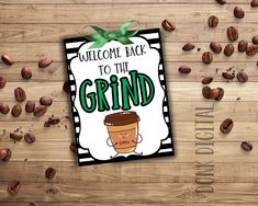 a welcome sign with coffee beans around it and the words,'welcome back to the grind '