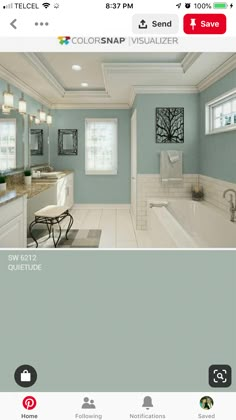 an image of a bathroom with blue walls and white fixtures on the wall, along with other items in the room