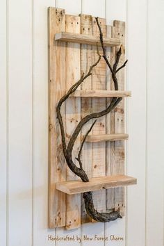 a wooden shelf with some branches on it