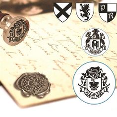 some stamps are laying on top of a piece of paper with letters and crests