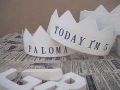 two paper crowns that say today tim and paloma on top of each other with the words today tim's