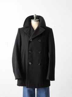 "This is a vintage US Navy peacoat.  The black wool coat features the classic fit with black anchor buttons.  CONDITION In good condition with wear consistent with age and use.  MARKED SIZE:  40 L MEASUREMENTS Bust:  44\"  ..  111.8 cm Length: 35\"  ..  88.9 cm Shoulders:  19\"  ..  48.3 cm Sleeve Length*:  28\"  ..  71.1 cm *measured from shoulder seam to end of sleeve on outside of sleeve.  1122130" Navy Peacoat, Black Wool Coat, Out Of My Mind, Coat Vintage, Us Navy, Black Wool, Black Coat, Wool Coat, Vintage Men