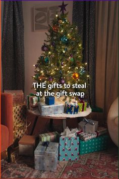 a christmas tree with presents under it and the words, the gifts to steal at the gift swap