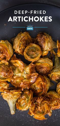 artichokes on a plate with the title deep fried artichokes