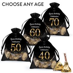 three black and gold birthday bags with the number seventy on them, one is filled with chocolate