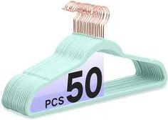 a pink and green plastic hanger with the number 50 on it's side