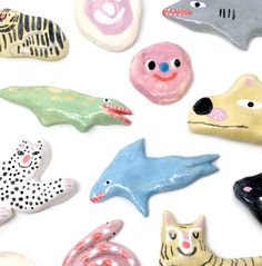 there are many different types of animal magnets on this page, including cats and dogs