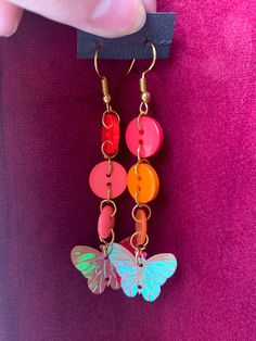 Asymmetrical red button earrings 3 buttons and butterfly sequins handmade Diy Earrings Clay, Earrings With Buttons, Earrings Out Of Buttons, Vintage Button Earrings, Handmade Multicolor Butterfly Earrings, Jewellery Tutorial, Multicolor Butterfly Earrings, Quirky Earrings, Red Butterfly