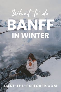 a woman sitting on rocks with the text what to do banff in winter