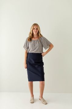 We have brought back one of our timeless designs this year, and this time in a classic navy color! The 'Anna' is a true pencil design for a flattering fit, features an elastic waistband for comfort, and comes in a modest knee length. With clean, simple lines and sophisticated style, the 'Anna' is the perfect pencil skirt your closet has been waiting for! Exclusively designed with you in mind! 68% Rayon, 27% Nylon, 5% Spandex Lined Hand Wash Cold Hang or Lay Flat to Dry Do Not Bleach Iron Low Hea Pencil Design, Navy Skirt, Layered Tops, Skirt Leggings, Simple Lines, Navy Color, Blouse Dress, Tops For Leggings, Sophisticated Style