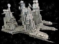 an image of a futuristic city in the space