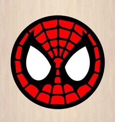 a spiderman face with white eyes on a wood background