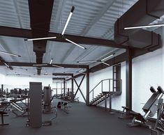 an empty gym with many machines in it