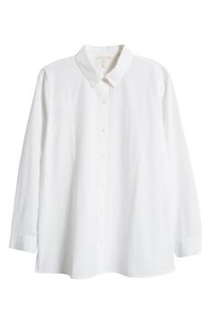 A classic spread collar furthers the modern-chic style of this button-up shirt fashioned from organic cotton. 29" length Front button closure Spread collar Long sleeves with button cuffs 100% organic cotton Machine wash, tumble dry Imported Simple Organic, White Button Down, Modern Chic, Fabric Gifts, Free Fabric, Anniversary Sale, Petite Size, Eileen Fisher, Chic Style