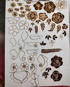 a sheet of paper with flowers and leaves on it