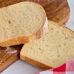 two slices of bread sitting on top of a cutting board