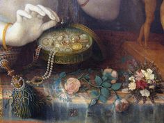 a close up of a painting with flowers and jewelry