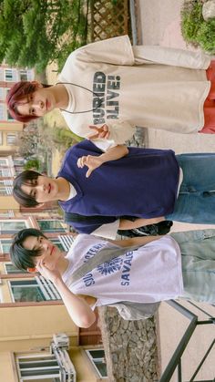 three young women standing next to each other