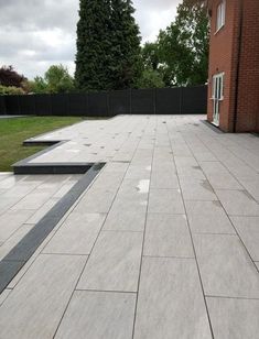 an empty patio with steps leading up to it