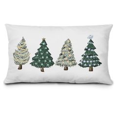 three christmas trees on a white pillow