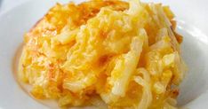 a white plate topped with macaroni and cheese