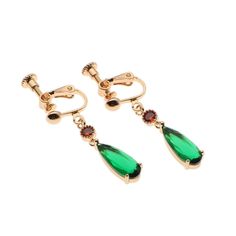 PRICES MAY VARY. WHAT YOU WILL GET: 1 Pair Gold Howls Earring with Box. It's Exactly Like The Characters,Howls Anime Cosplay Earrings HYPOALLERGENIC, ANTI-TARNISH, WATERPROOF material! Material :18k Gold-filled / Cubic Zirconia Length :Green teardrop gem = 1.8cm Green teardrop gem + red middle gem = 2.6cm Earrings are very lightweight at only 0.07 oz. It is perfect for everyday wear, parties, weddings, cosplay, dates, birthdays, halloween, christmas, comics and more. great gift for fans,girlfrie Howls Earring, Howls Moving Castle Earrings, Anime Earrings, Christmas Comics, Cosplay Jewelry, Anime Jewelry, Howl's Moving Castle, Earrings Hypoallergenic, Earrings And Necklace