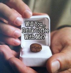 someone holding a coffee cup in their hands with the caption will you drink coffee with me?