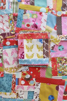 a colorful patchwork quilt with many different patterns