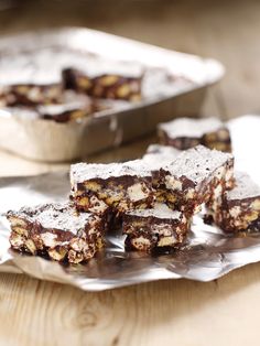 pieces of dessert sitting on top of a piece of tin foil