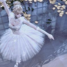 a painting of a ballerina dancer in white tutu and gold trimmings