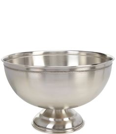 a large metal bowl sitting on top of a table