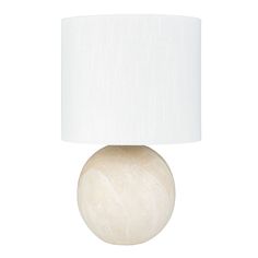 a table lamp with a white shade on the base and a light bulb attached to it