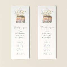 two bookmarks with flowers and books on them