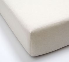 a close up view of a white mattress with no sheets on the top and bottom